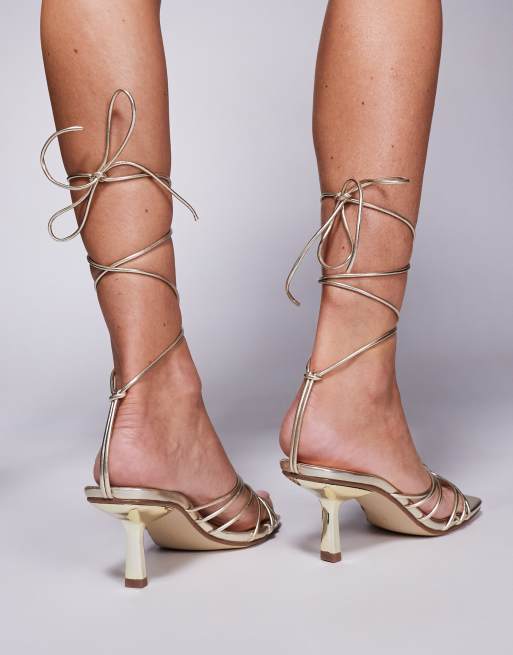 Public Desire Nora kitten heel tie leg sandals in gold