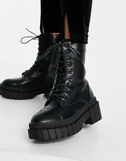 Public Desire Omega chunky lace up boots in black | ASOS