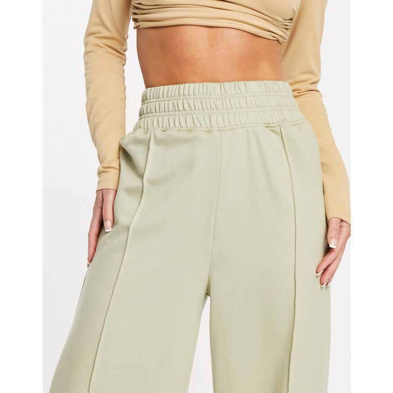 Pantaloni e leggings 1OH00 Public Desire - Pantaloni con fondo ampio e cucitura sul davanti, color salvia