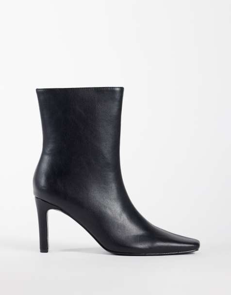 Public Desire Pixar heeled high ankle boots with chisel toe in black - view 1