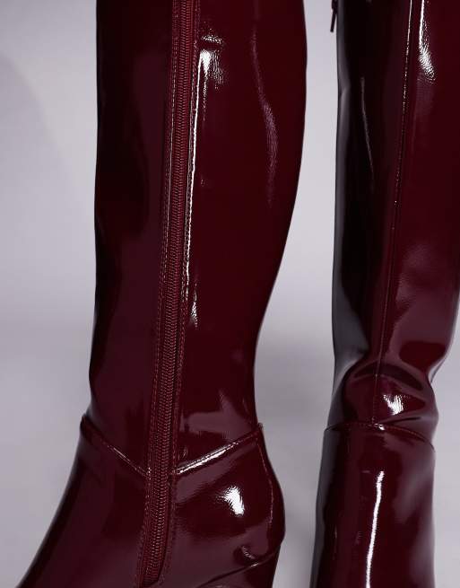 Public Desire Pose square toe heeled knee boots in burgundy ASOS