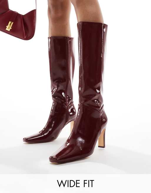 Public Desire Pose Wide Fit heeled knee boots in wine patent | ASOS