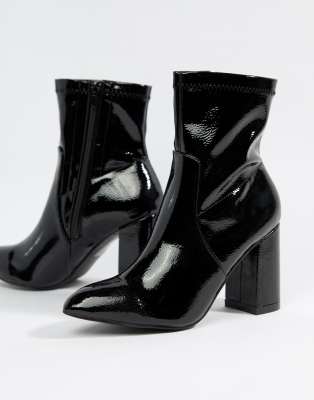 raya pointed toe ankle boots in black patent