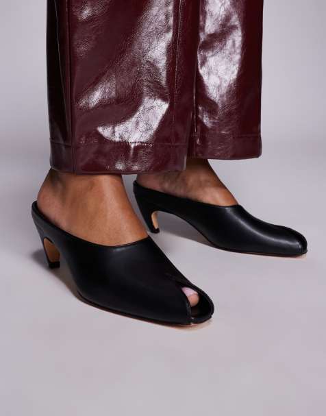 Public Desire Reuben curved kitten heel peep toe mules in black - view 1