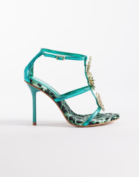 Public Desire – Sandaletten in Metallic-Grün mit Kitten-Absatz und Sonnen-Details aus Metall - view 1