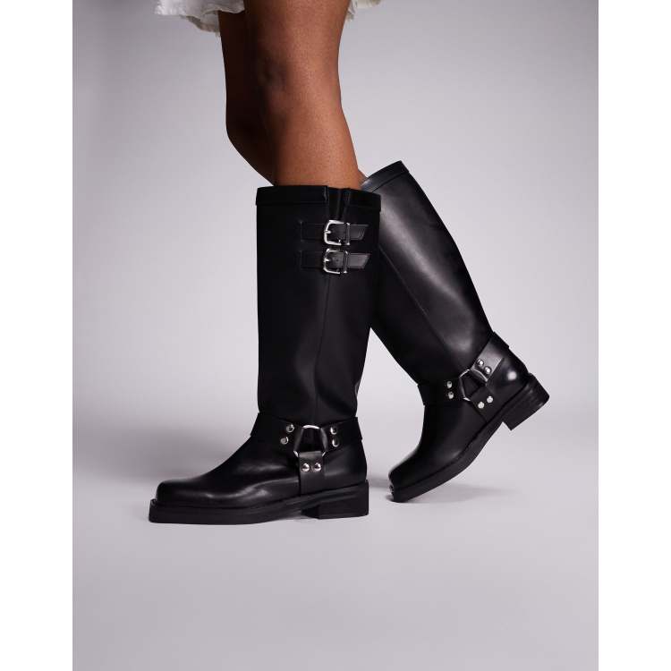 Public Desire Sirius flat harness knee boots in black | ASOS
