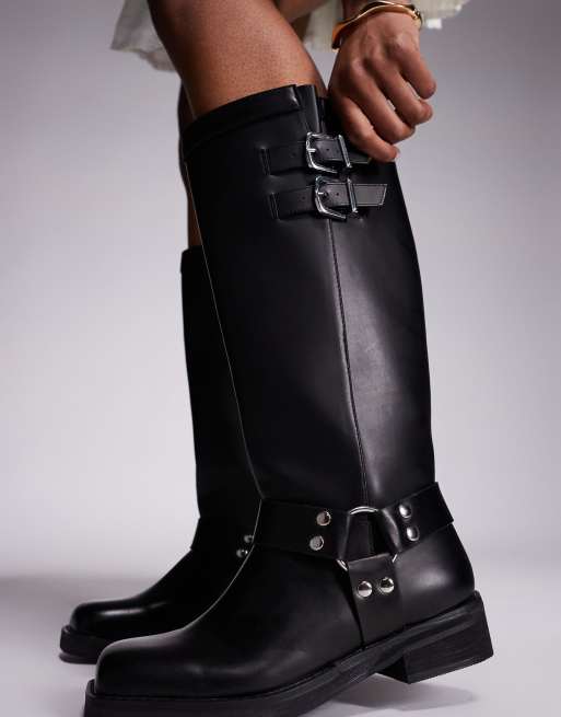 Public Desire Sirius flat harness knee boots in black | ASOS
