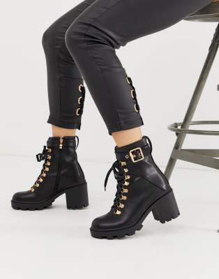 black boots with gold detail