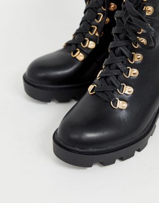 black and gold lace up boots