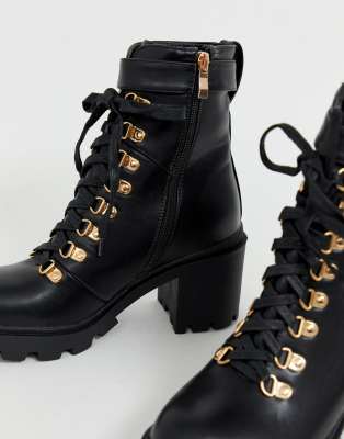 black and gold lace up boots