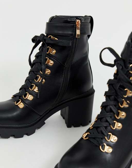 Black leather boots 2025 with gold hardware