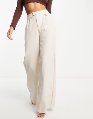 beige high waisted trousers