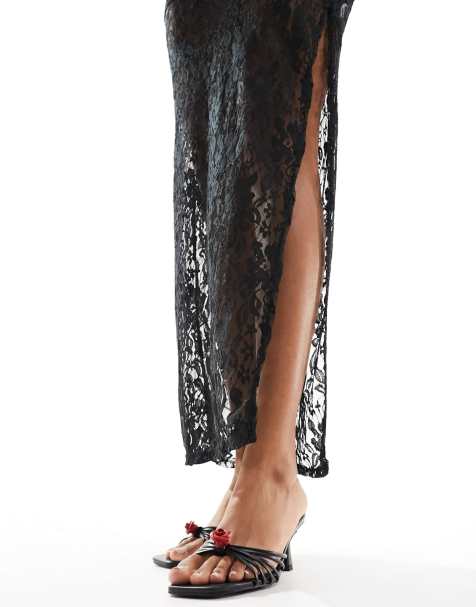 Public Desire – Vertigo – Mules in Schwarz mit mittelhohem Absatz und Ansteckblumendetail - view 1