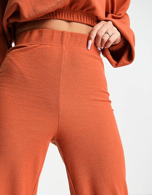 Tracksuits Public Desire waffle oversized wide leg jogger in rust 