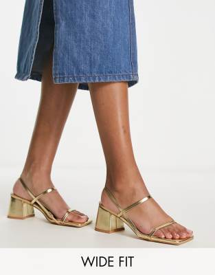 Public Desire Wide Fit - Exclusive - Just Realise - Riemchensandalen mit mittelhohem Absatz in Gold, breite Passform-Gol...