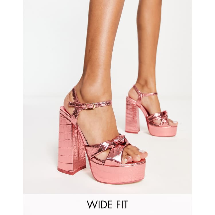 pink strappy high heels