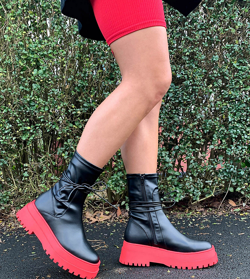 Public Desire Wide Fit Finale chunky flat ankle boots with tie in black and red