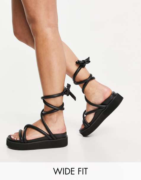 Public Desire Wide Fit Jolly flatform sandals with padded ankle tie in black - view 1