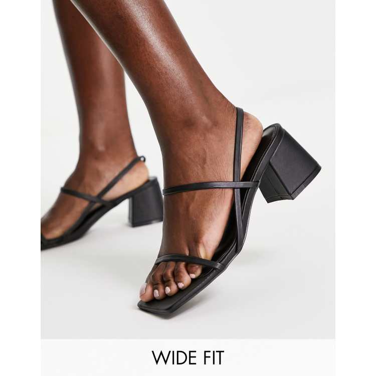 Black strappy 2025 sandals mid heel