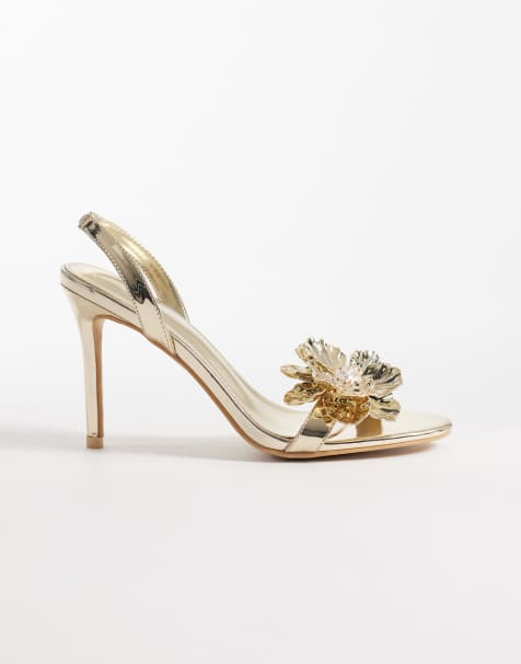 Public Desire Wide Fit – Ladybug – Sandalen in Gold mit mittelhohem Absatz und 3D-Blüte - view 1