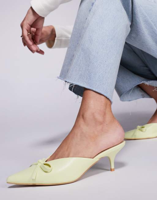 Public Desire Wide Fit Lionheart pointed kitten heel mules with bow in yellow