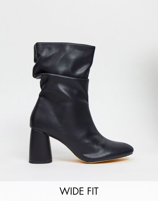 Public Desire Wide Fit Marshmallow slouch boots in black | ASOS