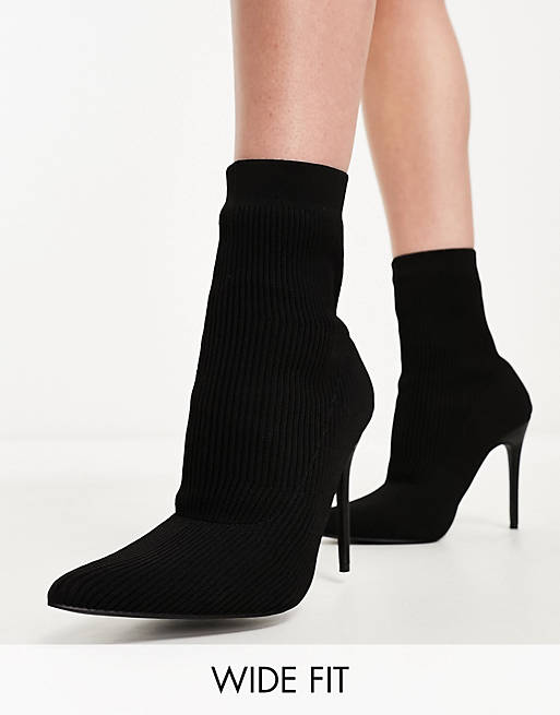 Public Desire Wide Fit Miraval heeled sock boots in black knit | ASOS