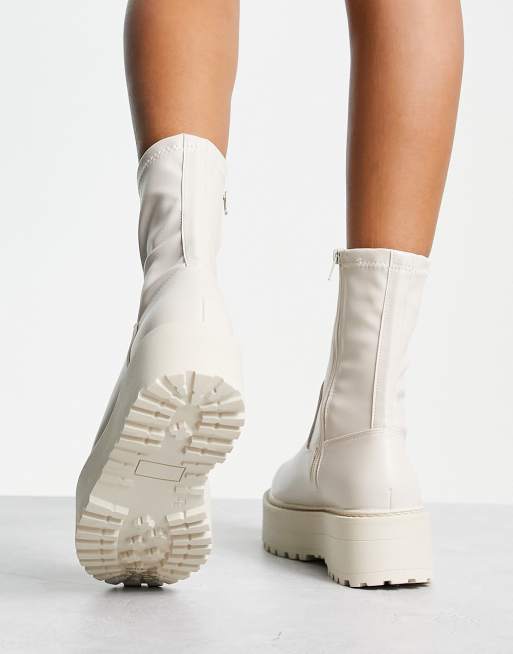 White ankle boots are in trend for this summer