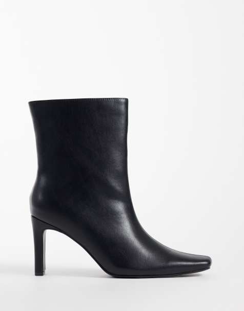Public Desire Wide Fit Pixar heeled high ankle boots with chisel toe in black - view 1