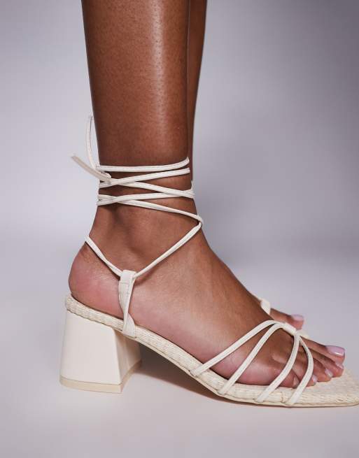 Public Desire Wide Fit Saffira mid heeled sandals with ankle ties in cream, 3 of 4