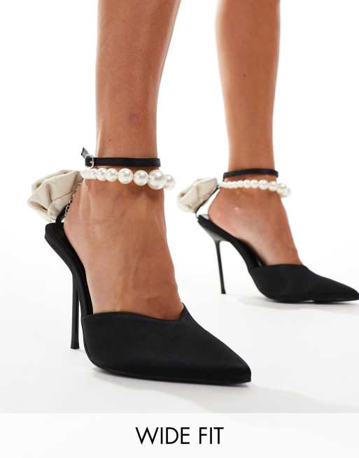Public Desire Wide Fit Sariah pointed heels in black with pearl ankle strap and corsage detail