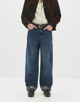 Pull & Bear - Baggy-Jeans in Dunkelblau mit Krempelsaum