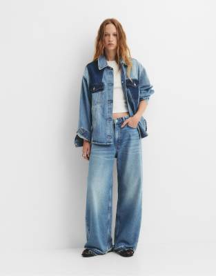 Pull & Bear - Baggy-Jeans in Dunkelblau mit mittelhohem Bund und Patchwork-Design