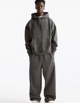 Pull&Bear baggy tracksuit bottoms in anthracite grey - view 1