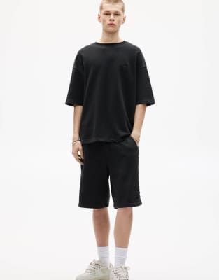 baggy washed jersey shorts in black