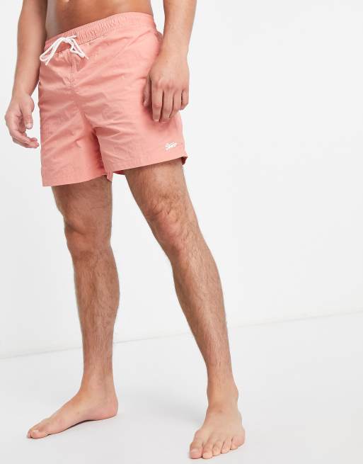 Salmon swim trunks on sale