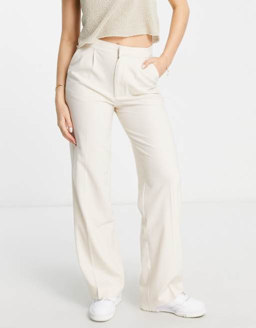 Pull&Bear – Białe spodnie o luźnym kroju ze średnim stanem