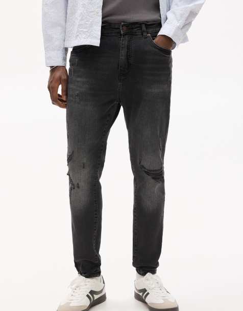 Pull&Bear – Bleksvarta jeans med morotsben och revor - view 1