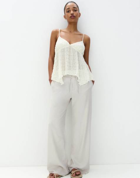 Pull&Bear - Broek met wijde pijpen, gestrikte taille en gerafelde zoom in grijs - view 1