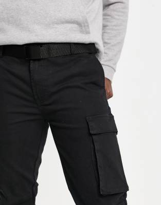 white cargo pants with black belt