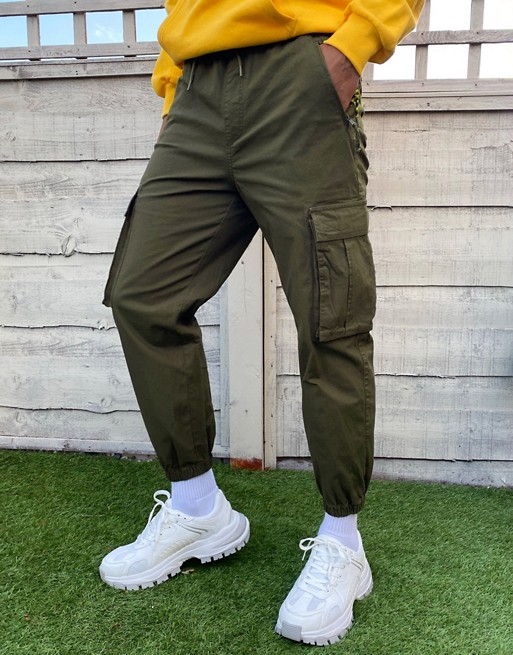 Pull&Bear cargo trouser with pockets in khaki green | ASOS