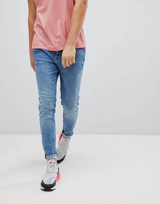 Pull&Bear carrot fit jeans in mid blue | ASOS