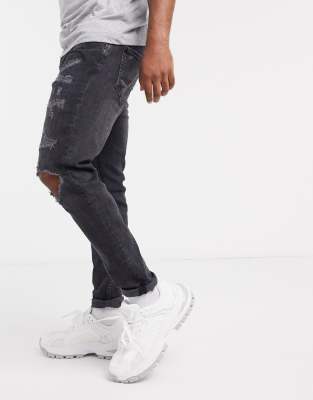 ripped carrot fit jeans