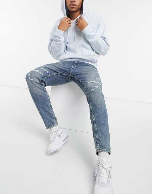 Pull&Bear carrot fit jeans with soft rips in mid blue ASOS