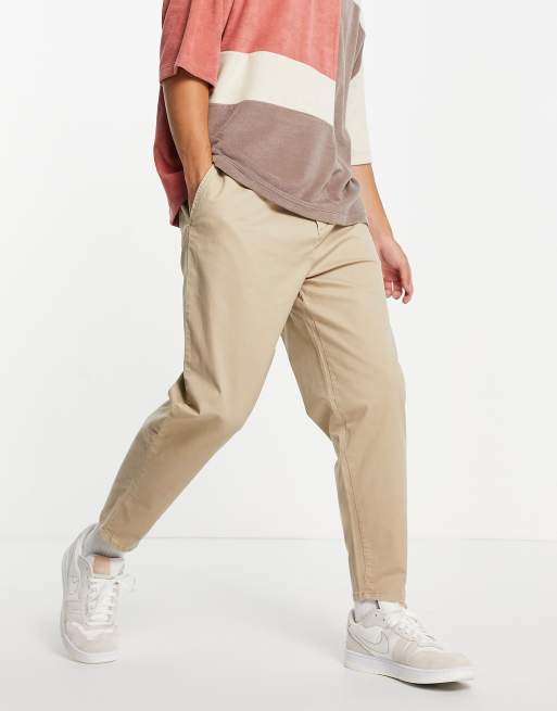 Pull&Bear – Chinosy oversize ze zwężanymi nogawkami w kolorze beżowym
