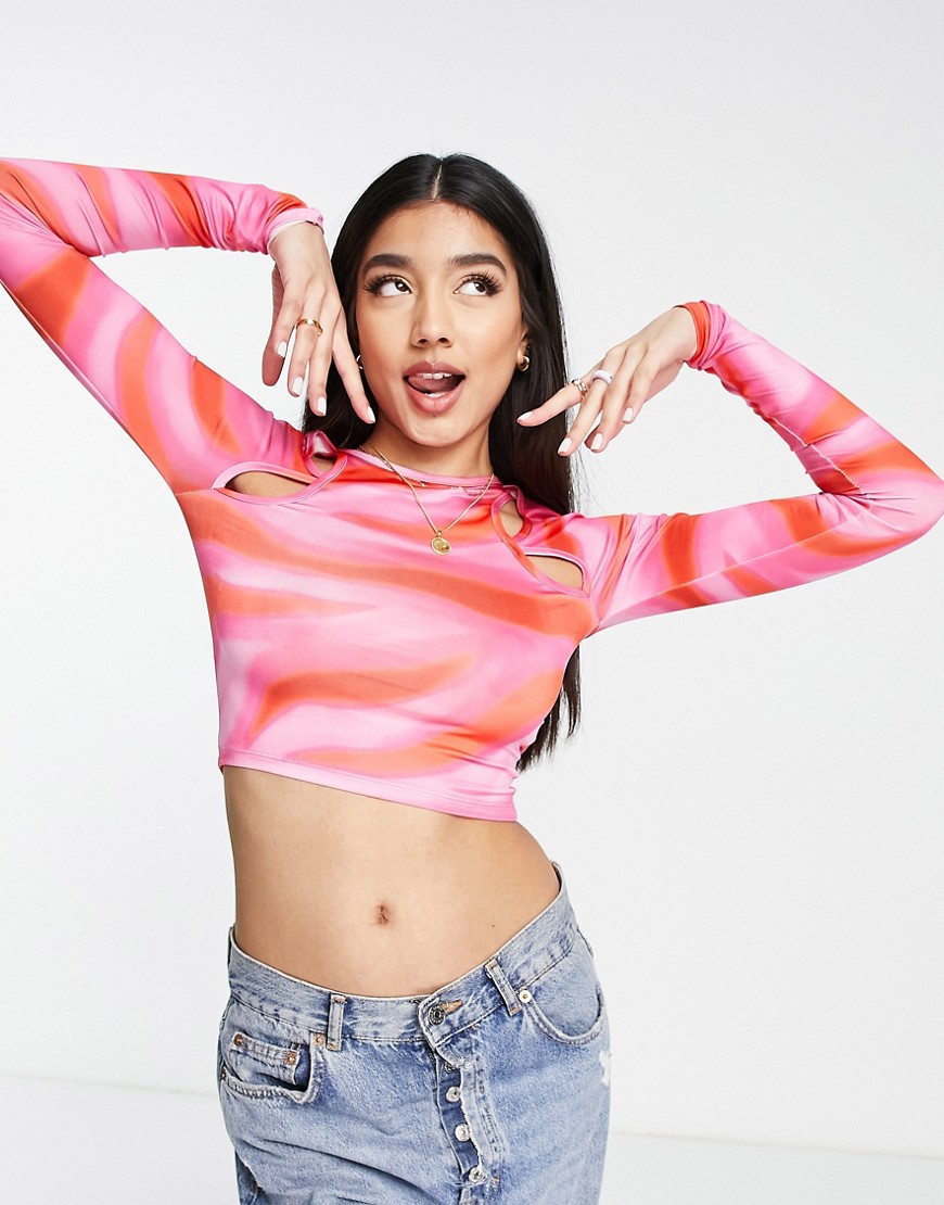 Pull & Bear contrast pattern long sleeve crop top with cut out detail in pink