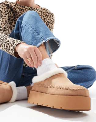 cozy faux fur lined slip on clogs in sand-Brown