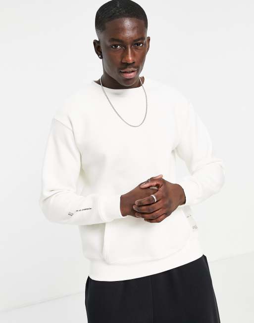 Pull Bear crew neck sweat with pocket and label detail in white ASOS