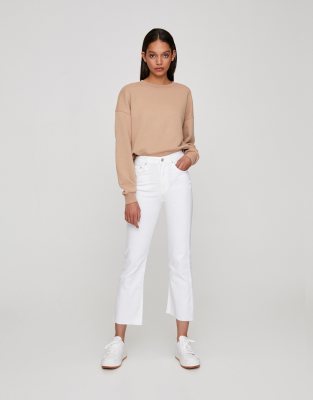 white cropped kick flare jeans