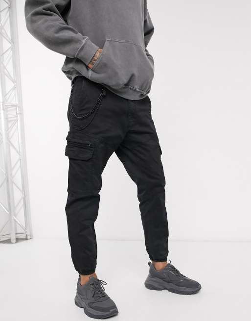 Pull&Bear cuffed cargo pants with chain in black | ASOS